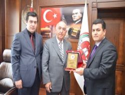 Turgutcan'a  vefa plaketi